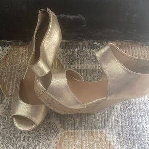 Madden girl. Gold wedges